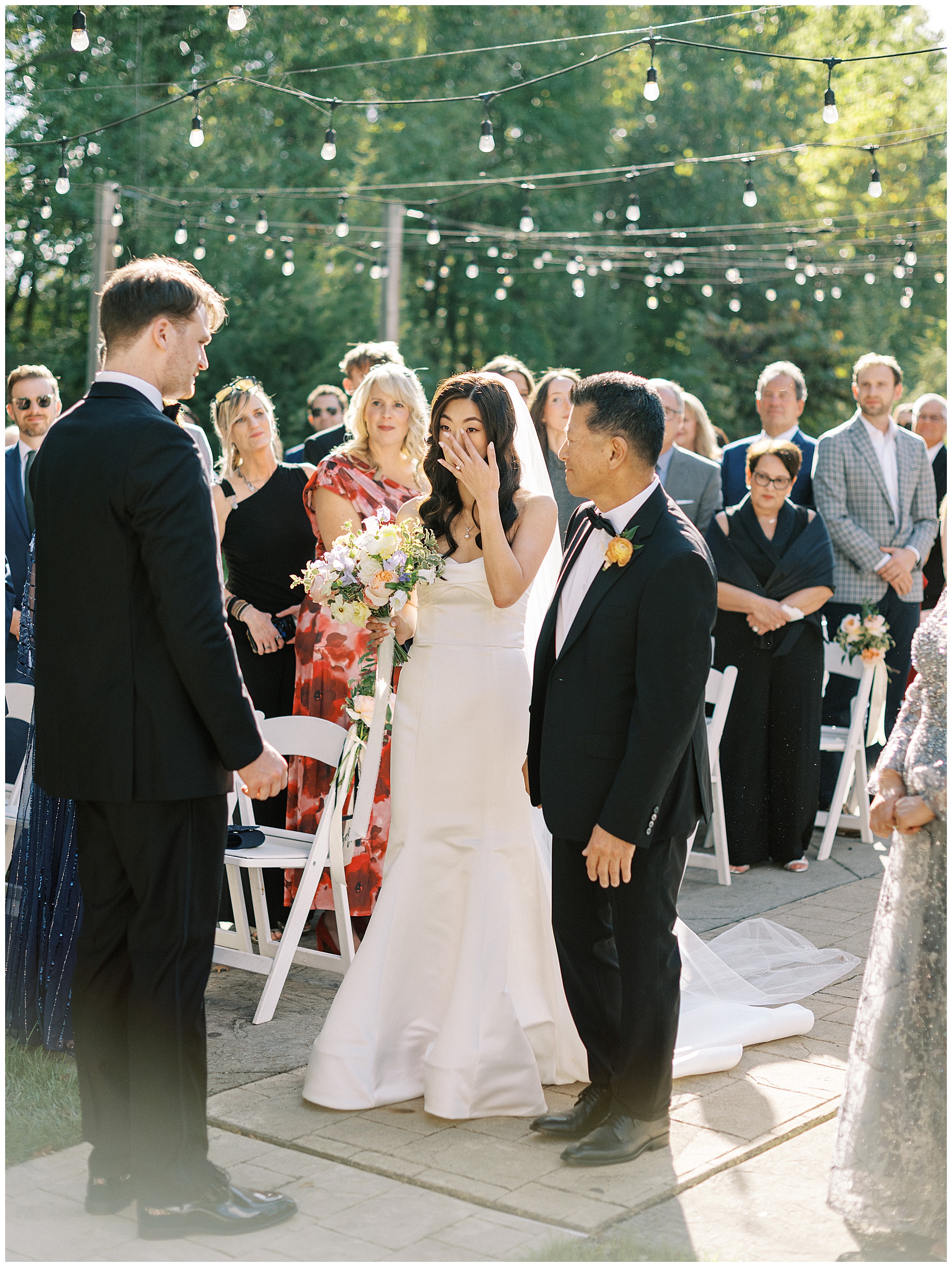 A joyful Estate at New Albany wedding featuring fall foliage, spring-inspired florals, and Esther and Peter's ceremony and reception
