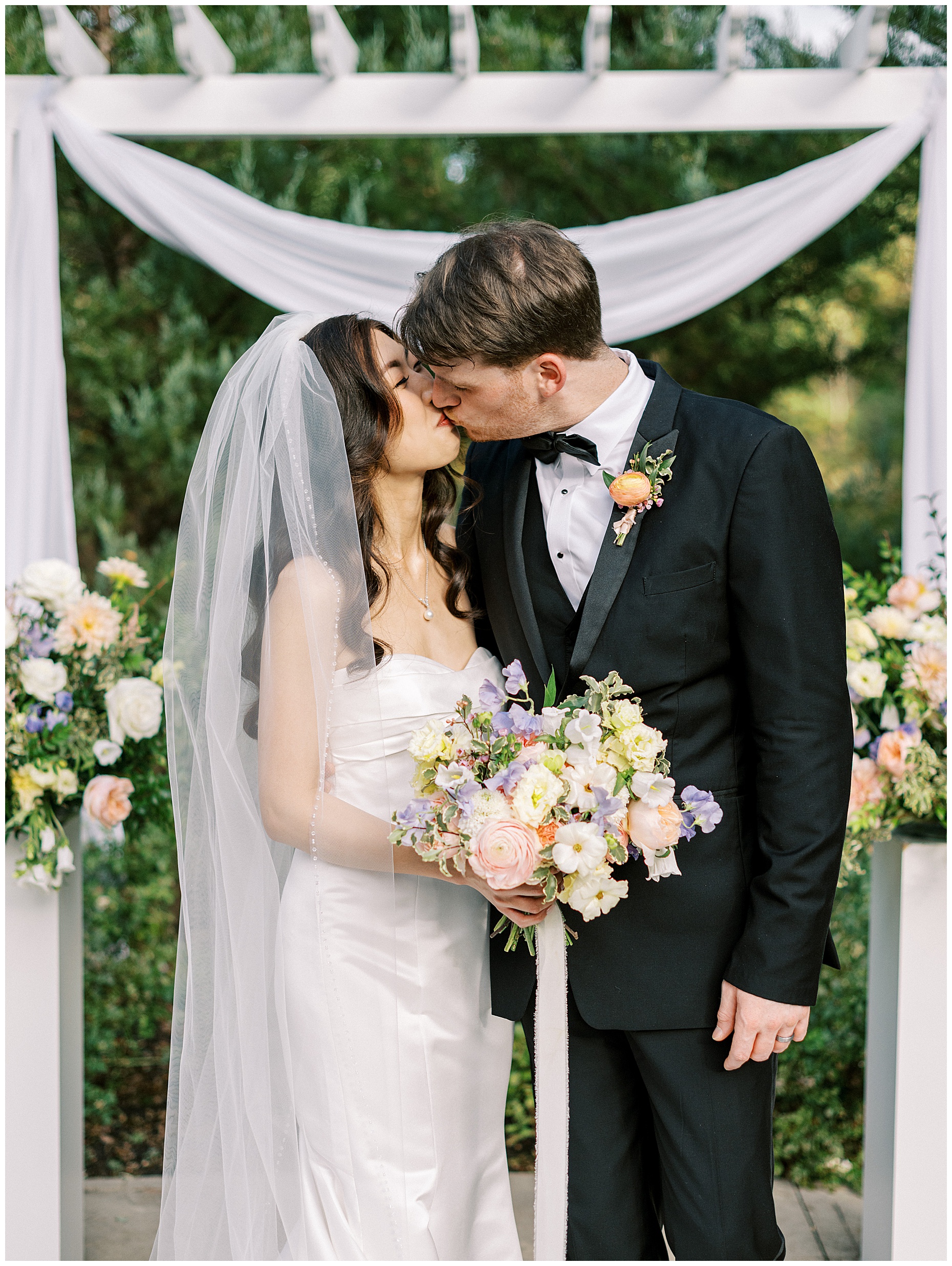 A joyful Estate at New Albany wedding featuring fall foliage, spring-inspired florals, and Esther and Peter's ceremony and reception
