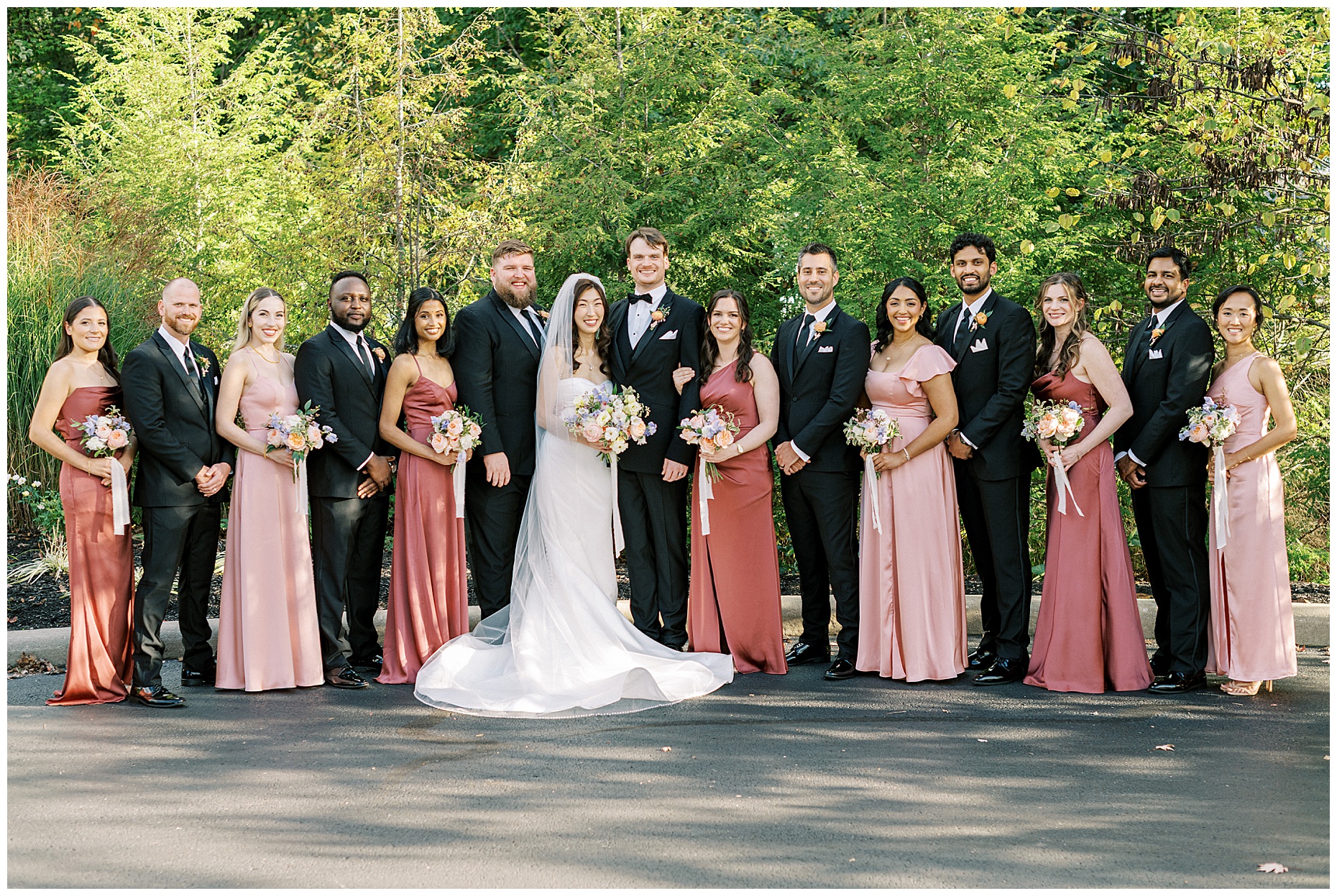 A joyful Estate at New Albany wedding featuring fall foliage, spring-inspired florals, and Esther and Peter's ceremony and reception