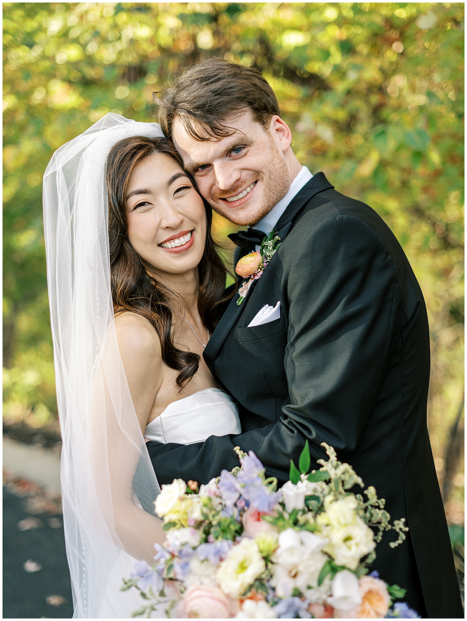 A joyful Estate at New Albany wedding featuring fall foliage, spring-inspired florals, and Esther and Peter's ceremony and reception
