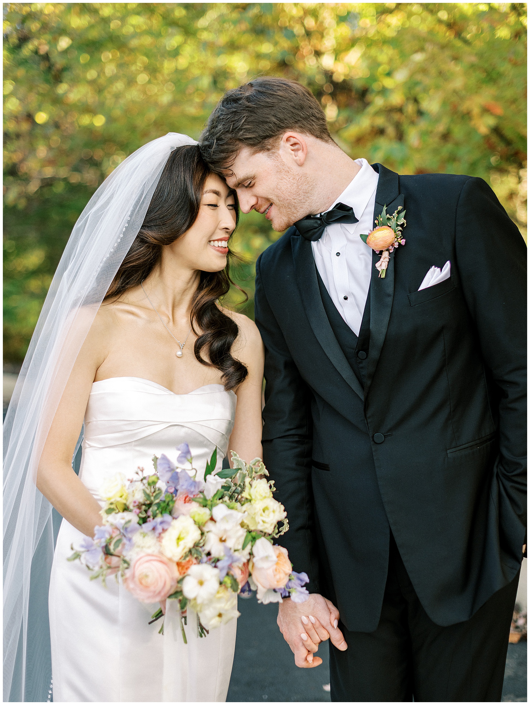 A joyful Estate at New Albany wedding featuring fall foliage, spring-inspired florals, and Esther and Peter's ceremony and reception