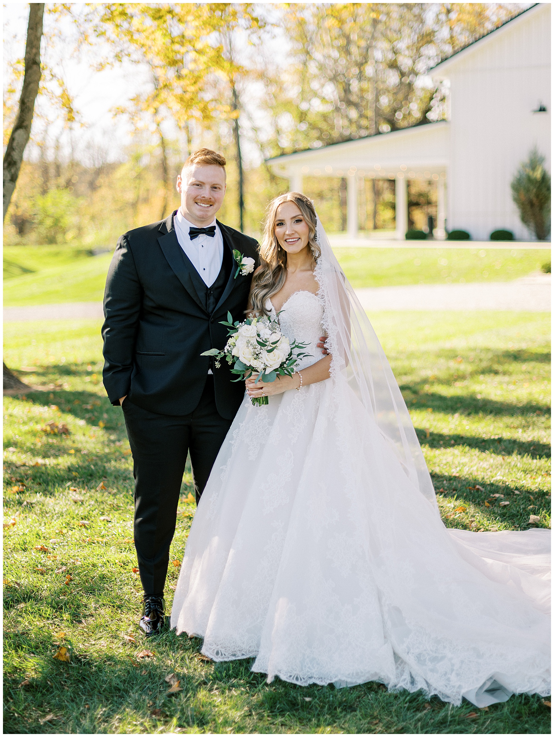 A heartfelt Cliffside Acres wedding featuring fall foliage, classic black and white details, and Lindsey and Sam's ceremony and reception