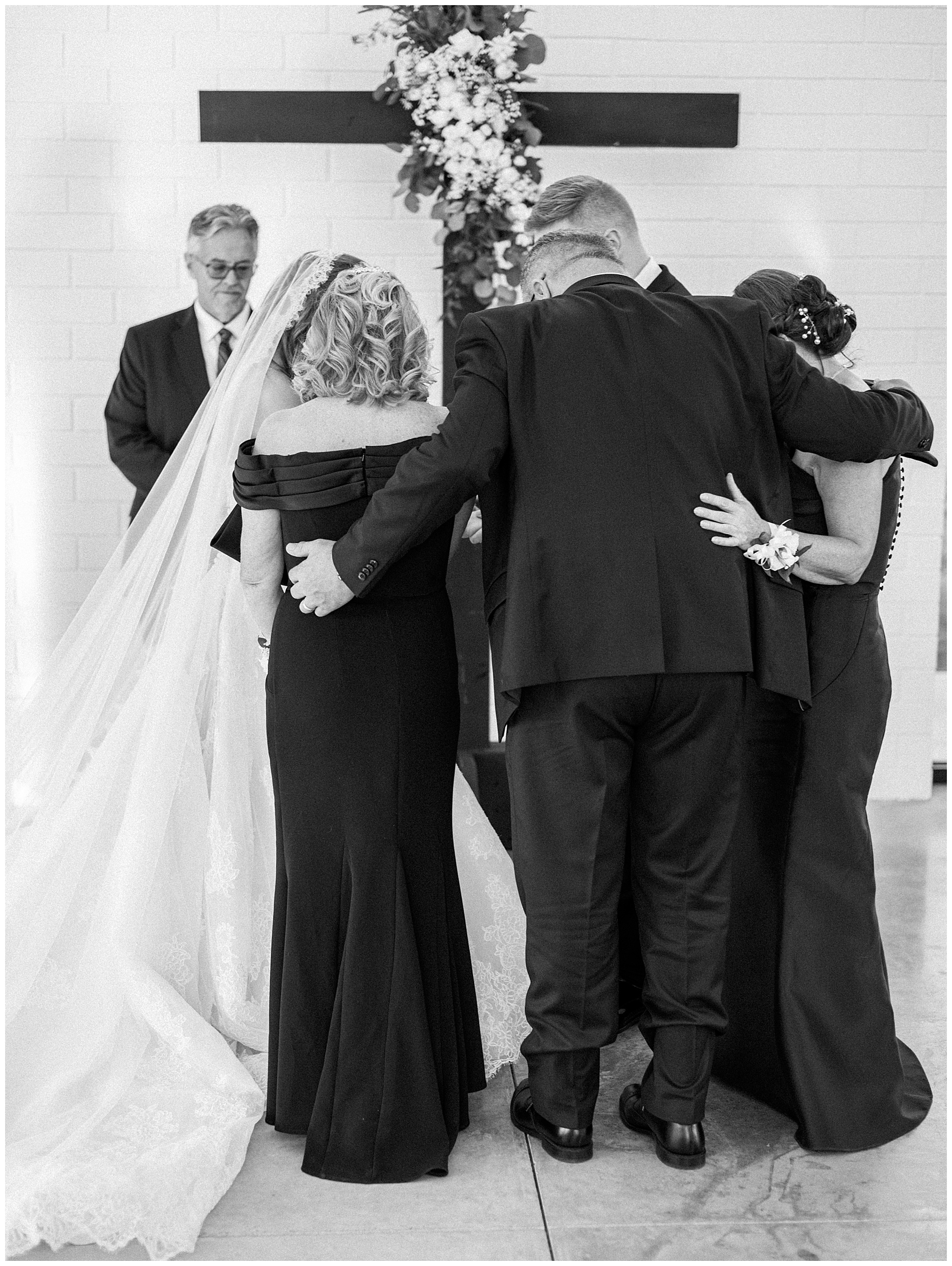 A heartfelt Cliffside Acres wedding featuring fall foliage, classic black and white details, and Lindsey and Sam's ceremony and reception