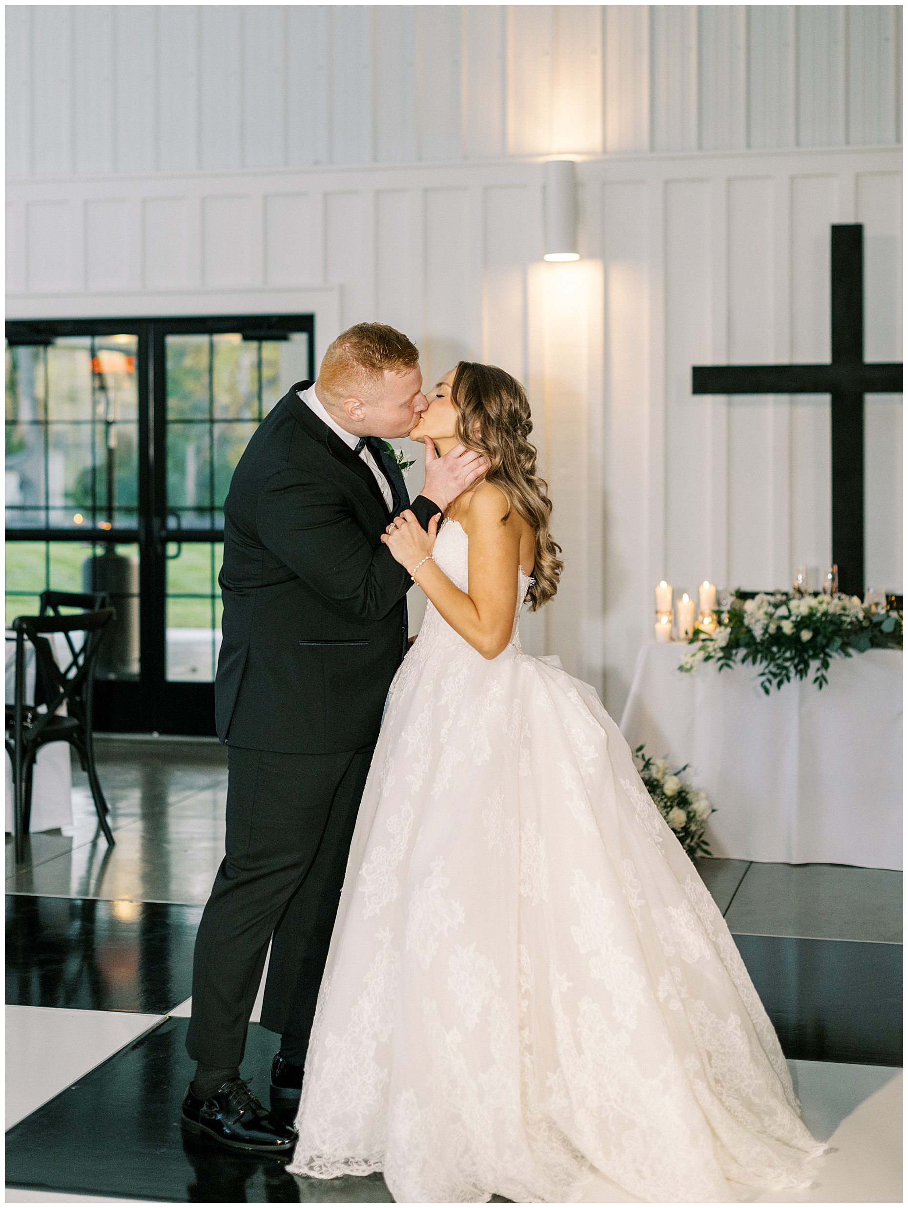 A heartfelt Cliffside Acres wedding featuring fall foliage, classic black and white details, and Lindsey and Sam's ceremony and reception