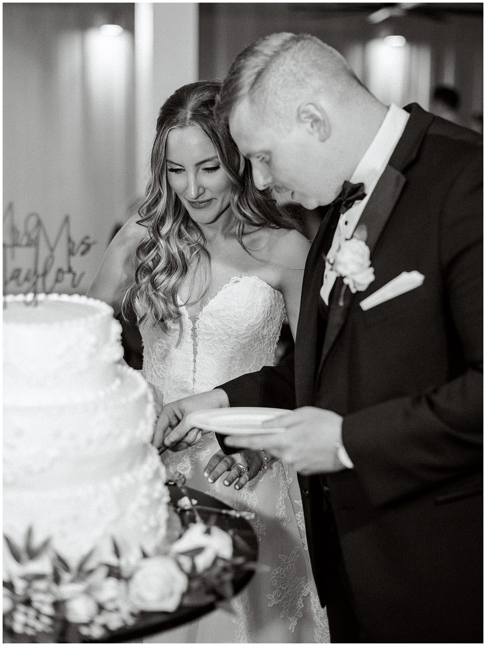A heartfelt Cliffside Acres wedding featuring fall foliage, classic black and white details, and Lindsey and Sam's ceremony and reception